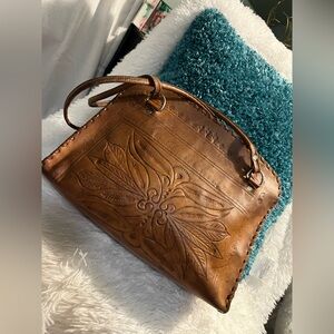Vintage tooled leather handbag